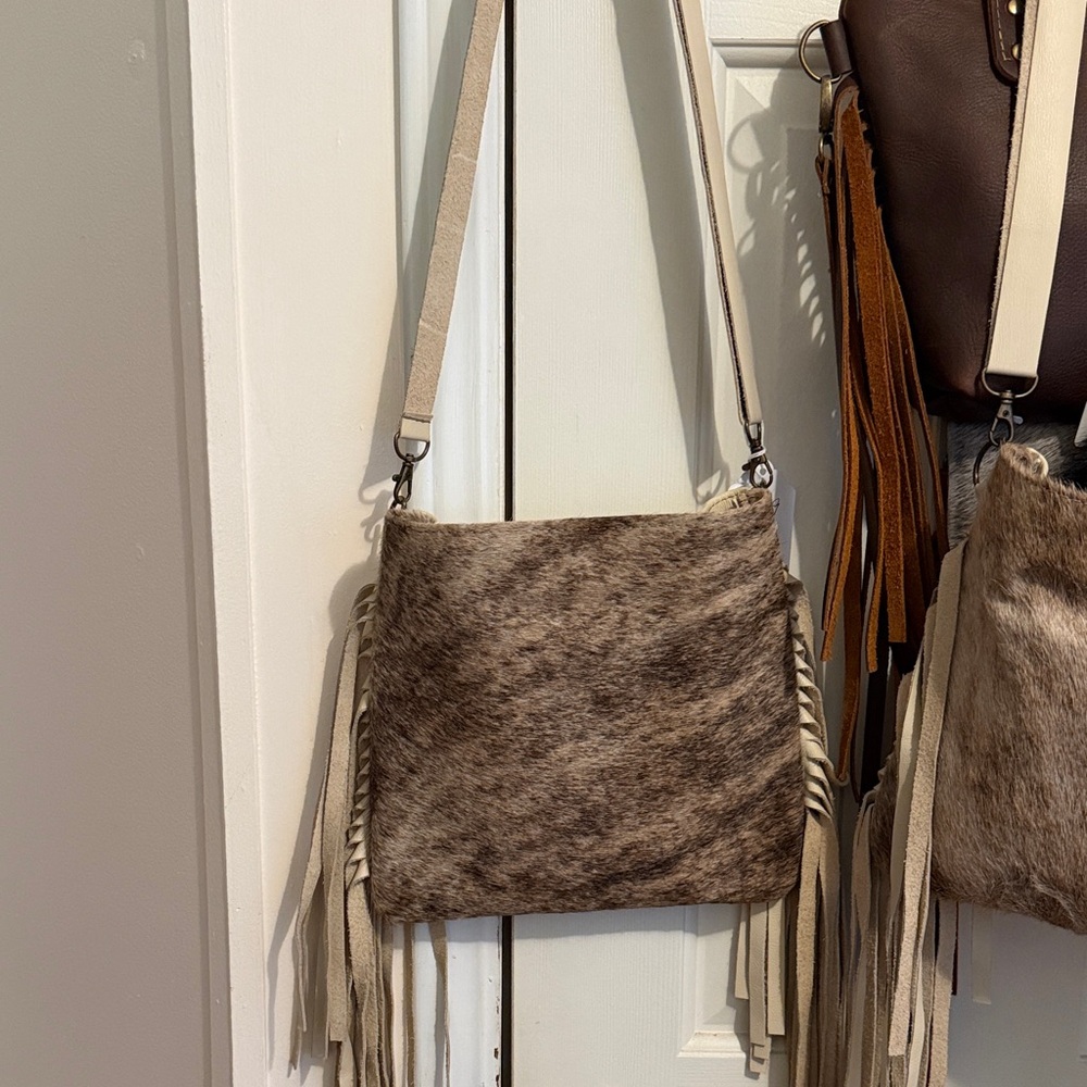 Elegant Tan and Cream Crossbody Bag with Fringe